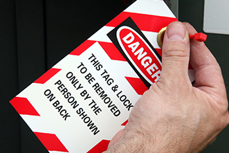 Warning danger tag on machine