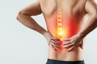 Person comforting their lower back